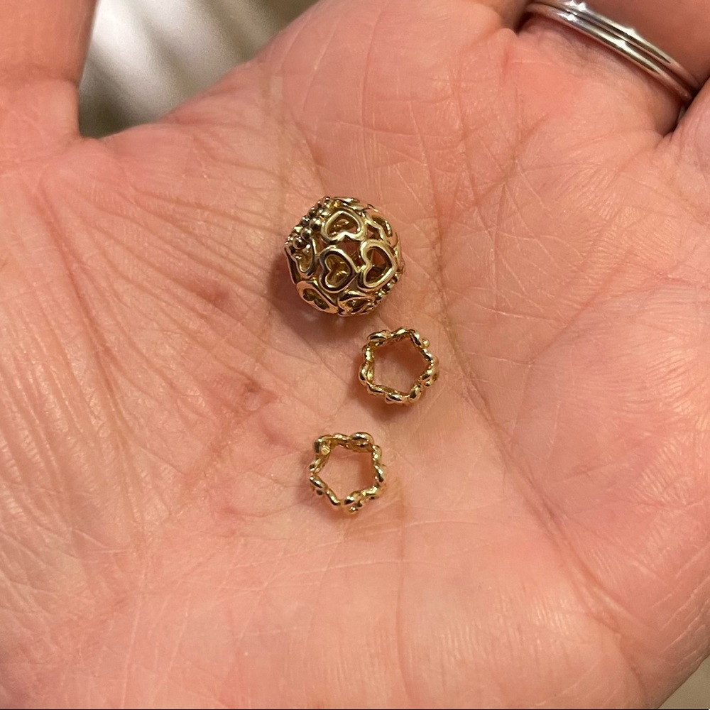 Bundle 14k open heart charm and 2 14k trinity spacers.